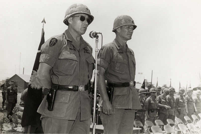 Major General Keith Ware presents Brigadier General William S. Coleman with awards.